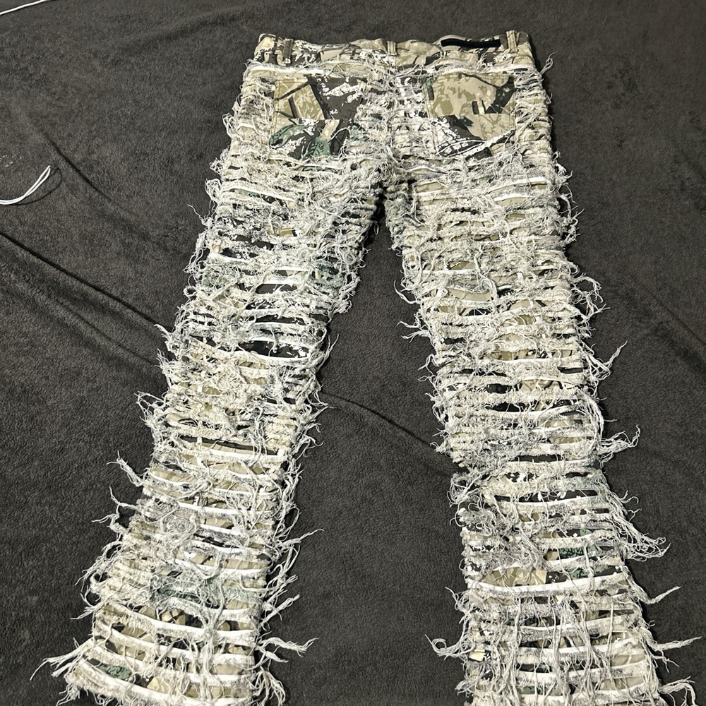 Custom distressed pants with real paint splatters